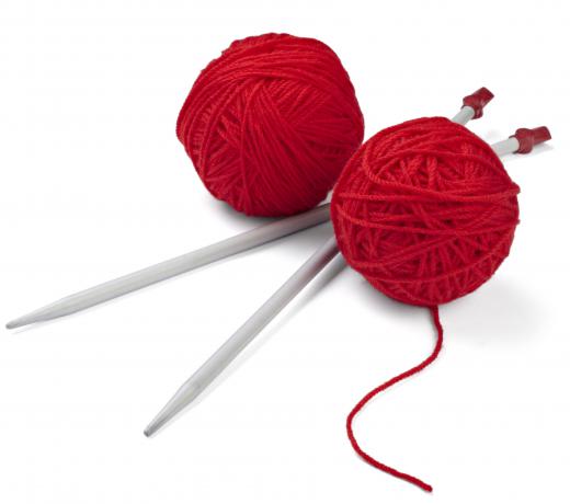 Knitting needles and yarn.