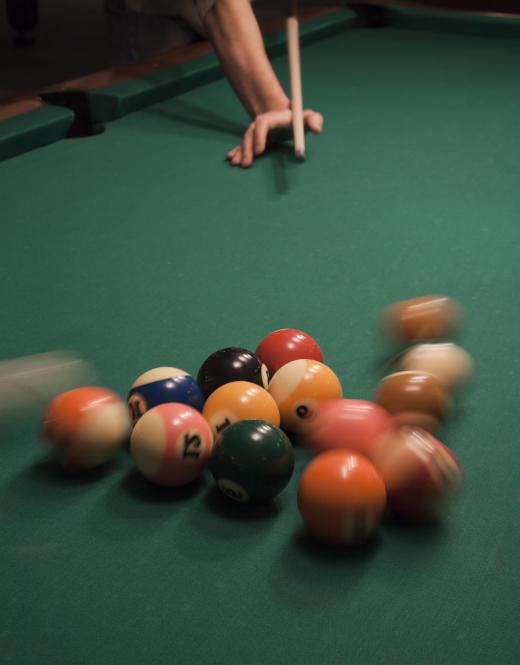 There needs to be adequate space around a pool table to allow shots.