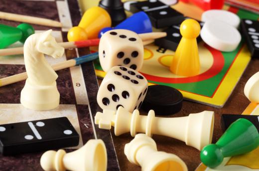 Small children are often drawn to board games with colorful gaming pieces.