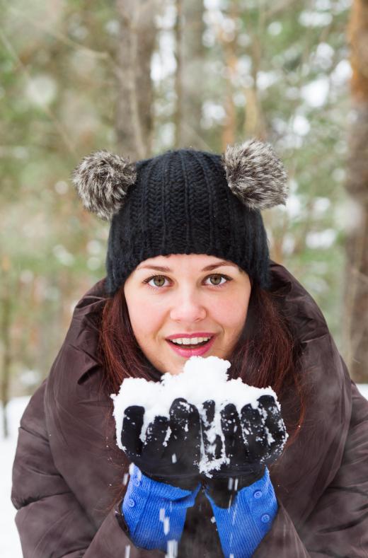 Snowball fights can be fun for people of all ages.