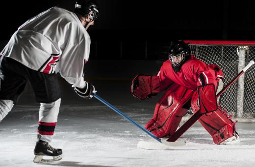 A hockey team may engage in a shootout where three players take one-on-one penalty shots with the other team's goalie during overtime.