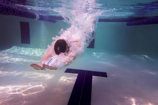 Octopush, or Underwater Hockey, is generally played in a swimming pool with a weighted puck and “pusher sticks.”.