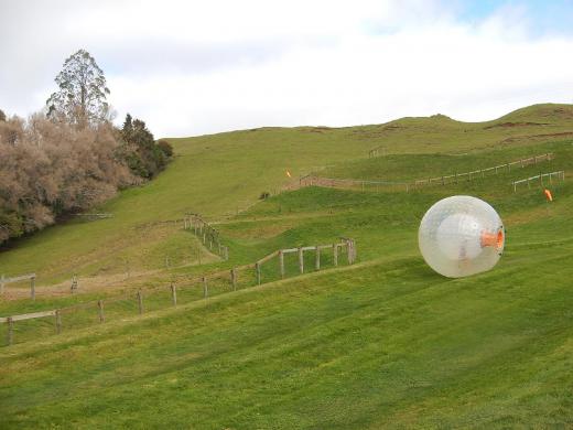 Zorbing involves rolling across water or down a slope in a giant inflatable ball.